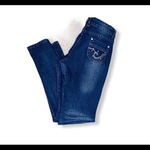 Blue studded skinny jeans